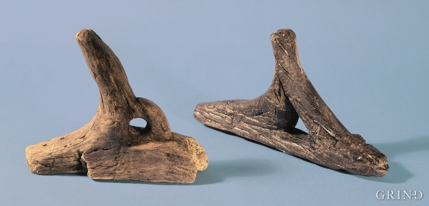 Two of the rowlocks which have been found in the bogs Mangersnes, Radøy